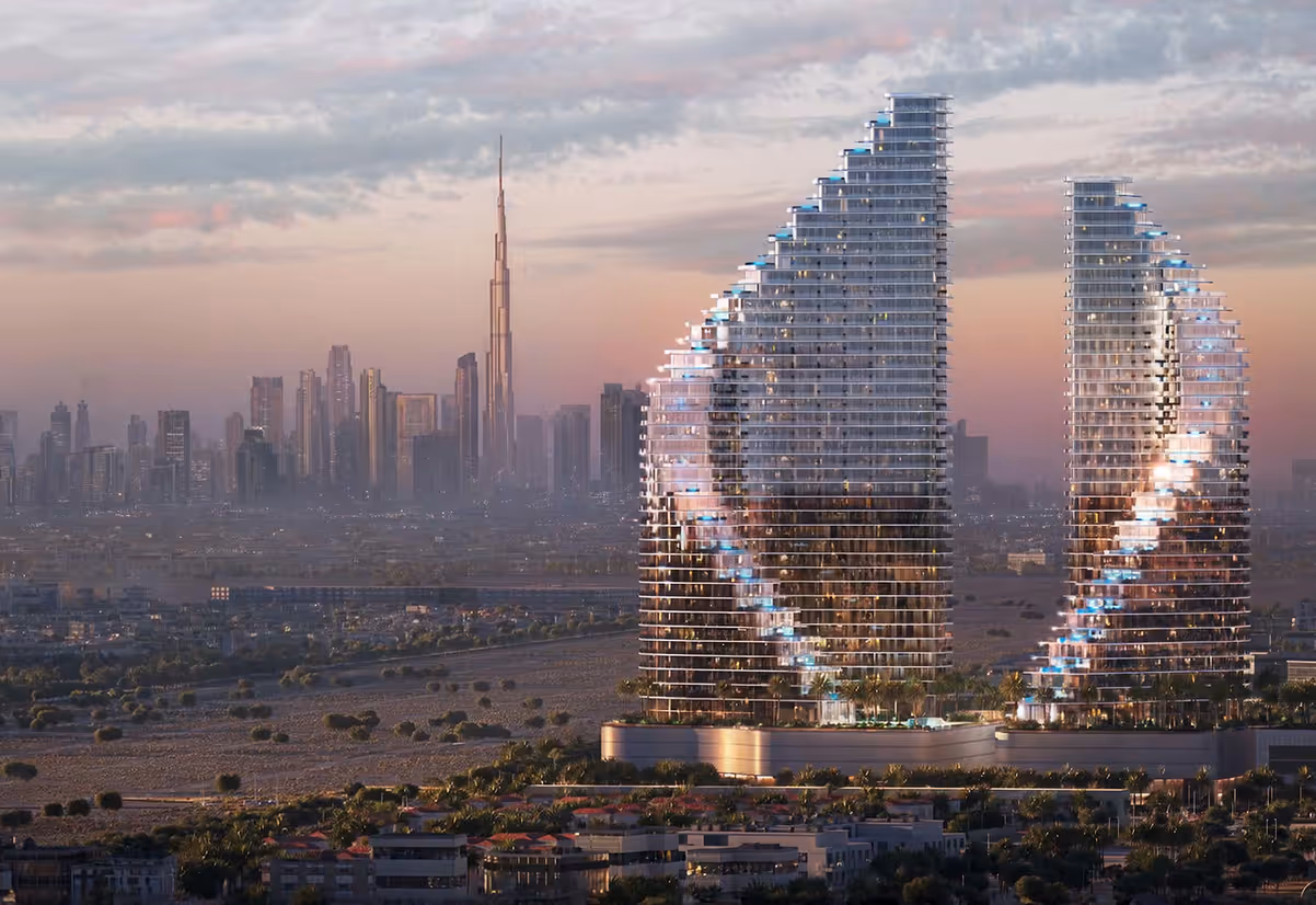 Binghatti Flare apartments Dubai luxury residential towers with Burj Khalifa skyline at sunset