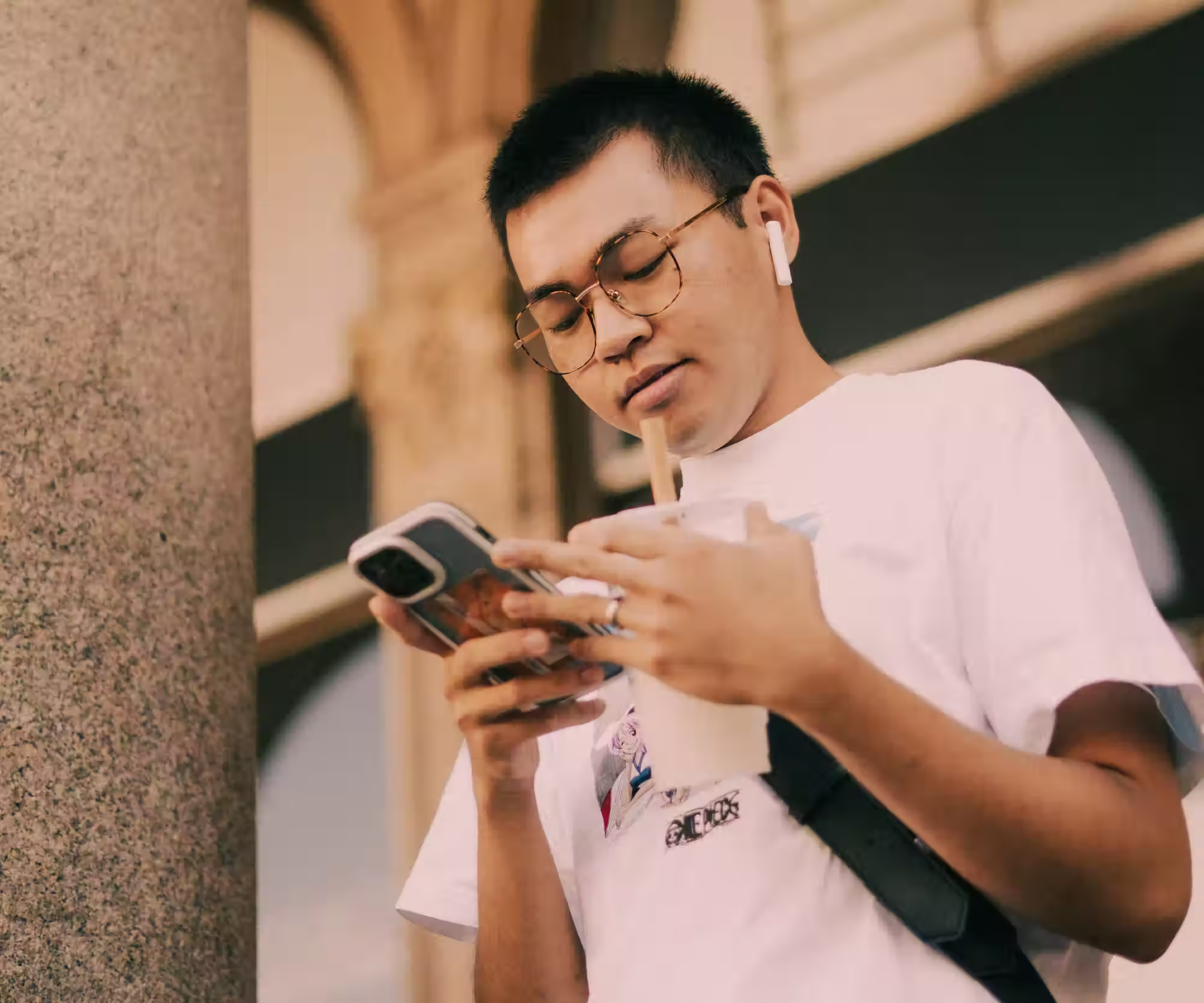 Young man looking at his phone
