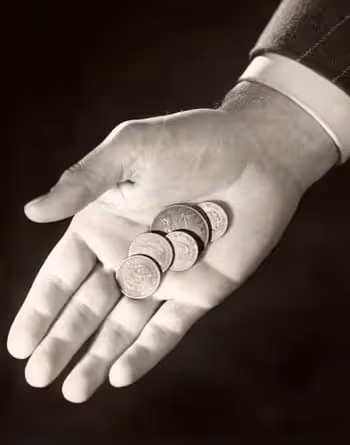 hand with some coins in it