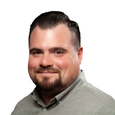 Headshot of Ryan Caravahlo. 