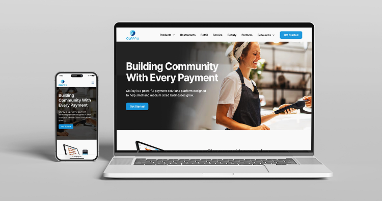 The hero section of the OlaPay website shown in a laptop and phone mockup. 
