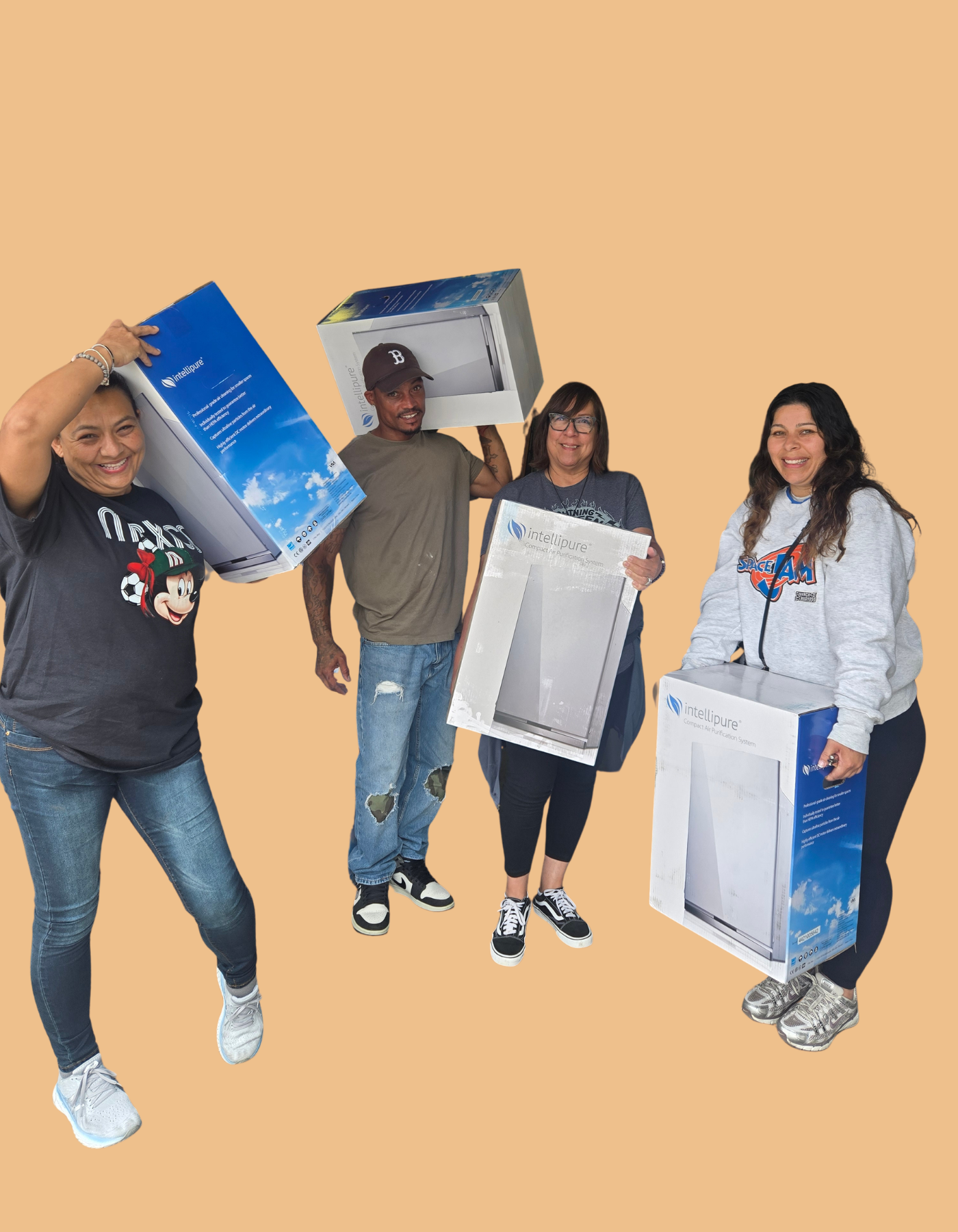Volunteers with KAUSE hold donated supplies