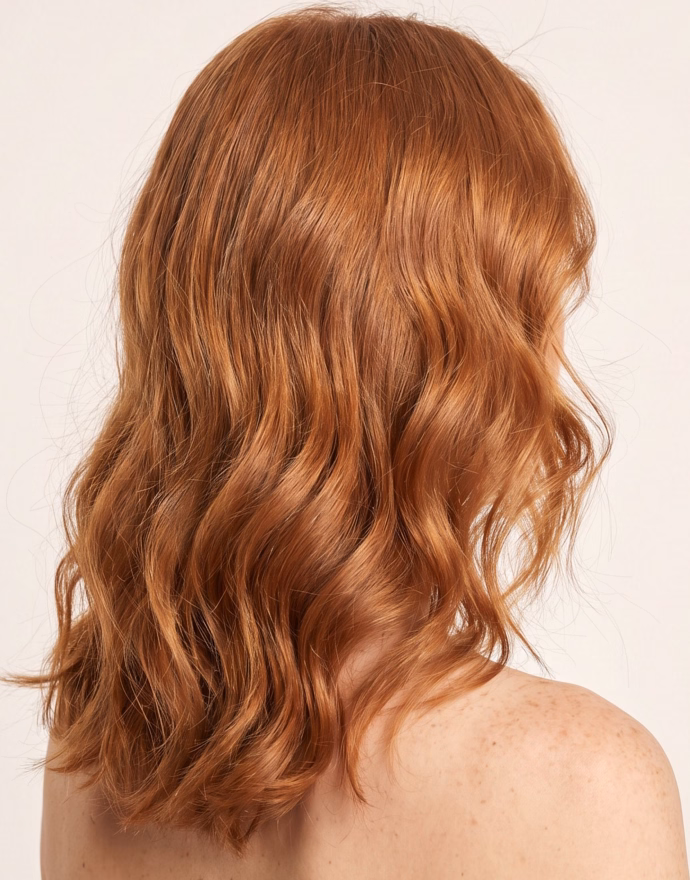 Cabelo ruivo ondulado e volumoso