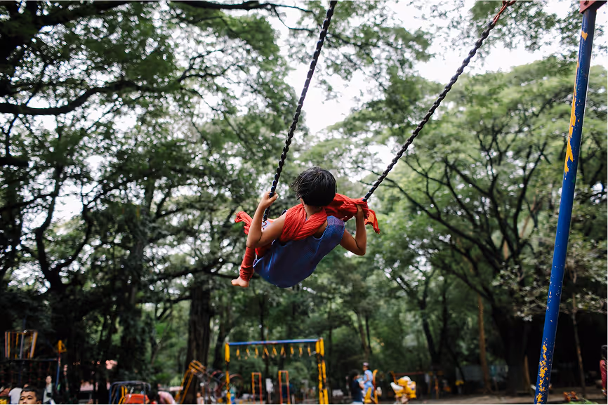 Kid on a swing