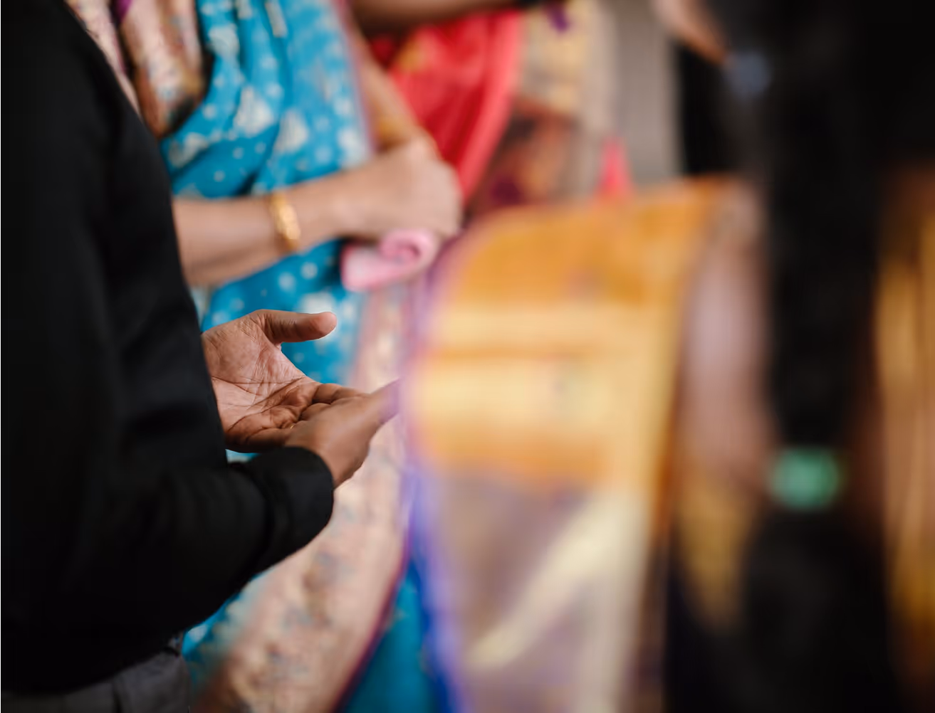 women's hands in a group