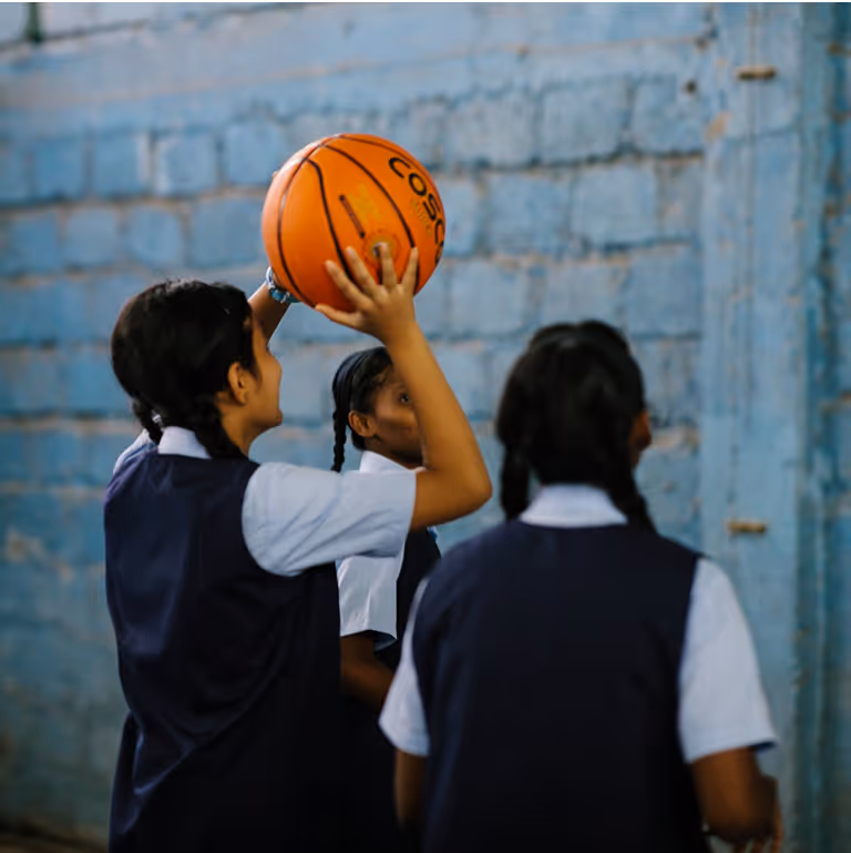 girls playing basketball