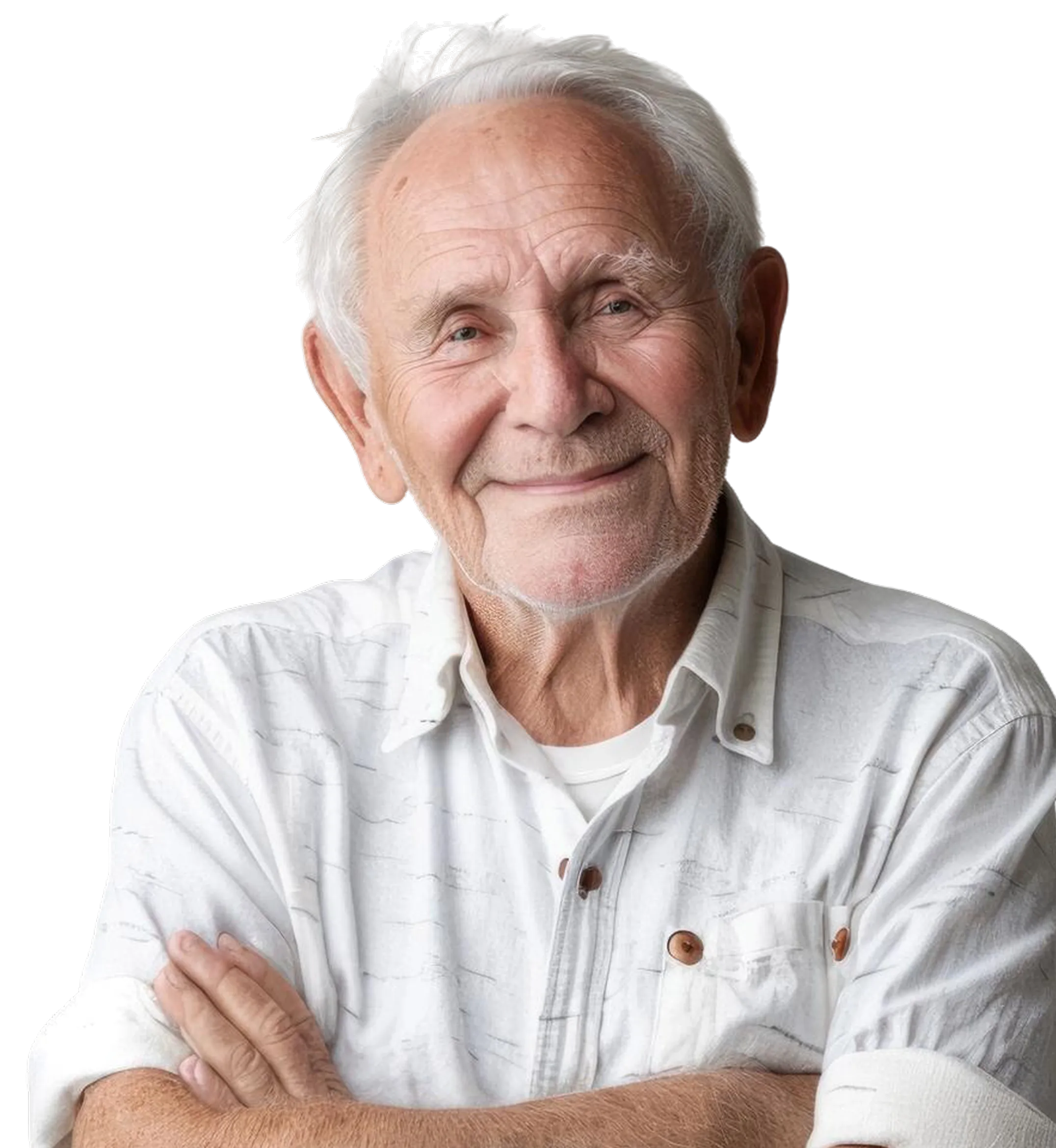 Smiling elderly man with white hair wearing a white shirt and crossing his arms.