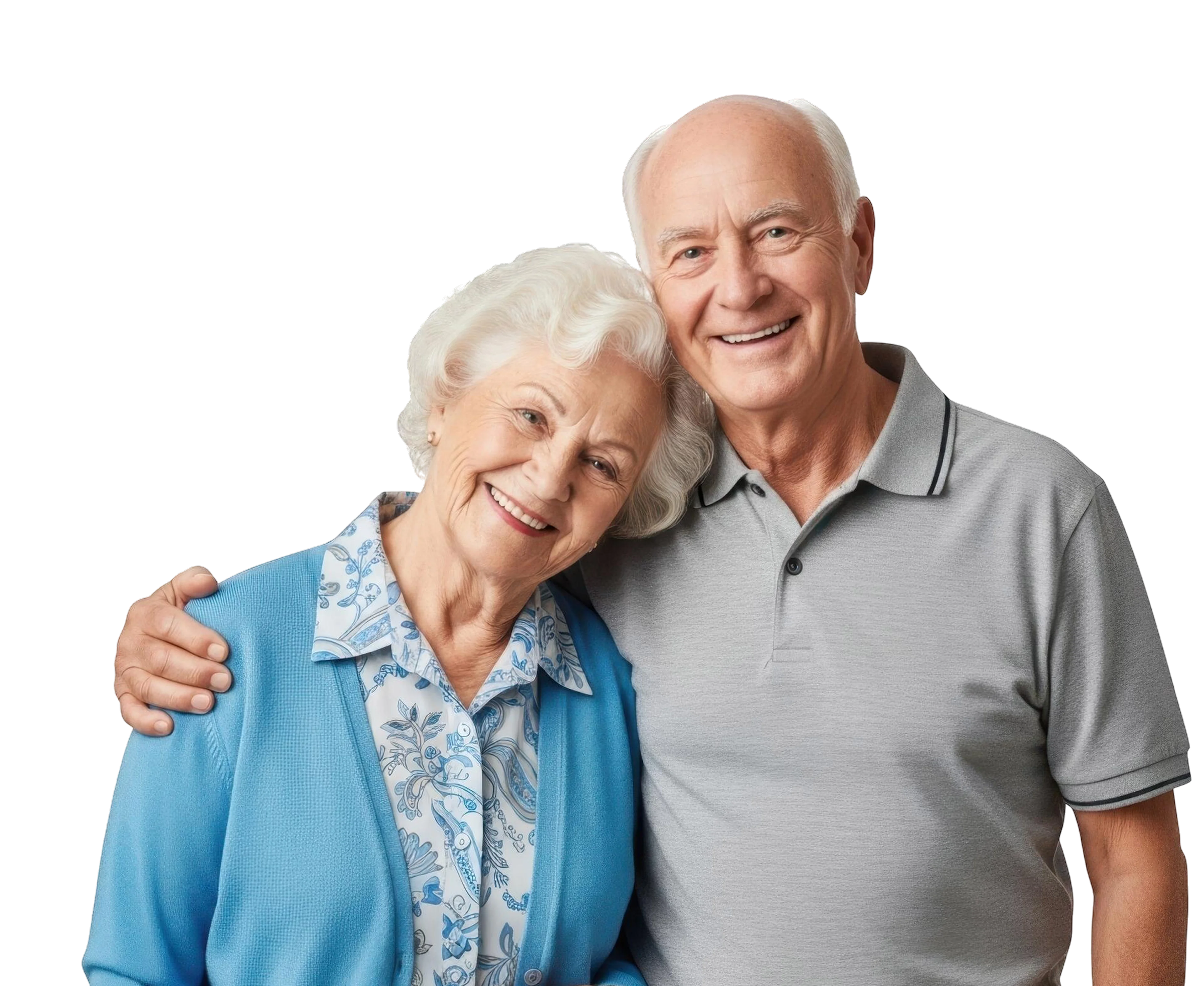 Smiling elderly couple with the man in a gray polo shirt embracing the woman in a blue cardigan and floral blouse.