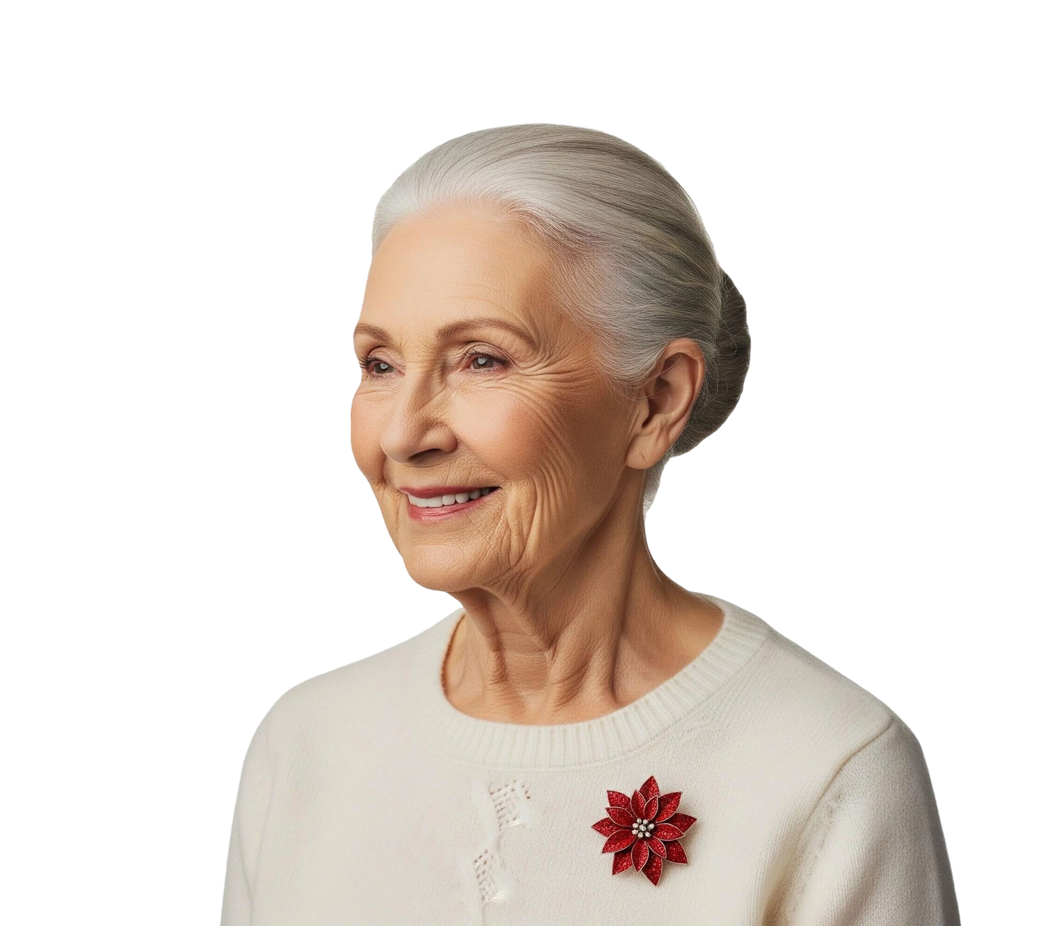 Smiling elderly woman with white hair in a bun, wearing a white sweater with a red flower brooch.