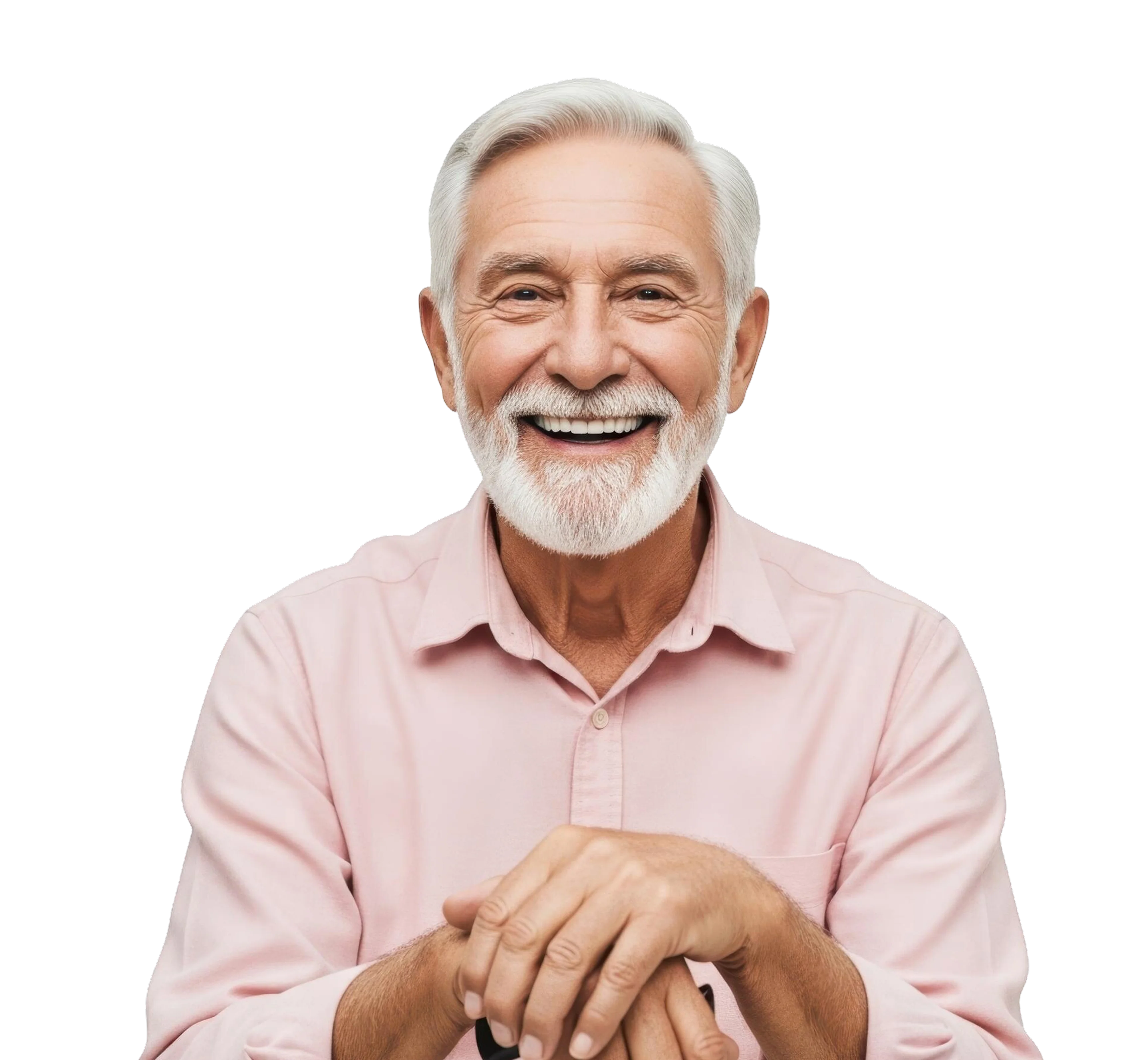 Smiling elderly man with white hair and beard wearing a pink shirt, resting hands on a cane.