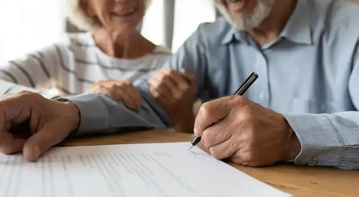 An older couple estate planning with an attorney