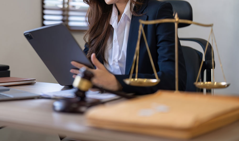 A lawyer looking over a court case filing