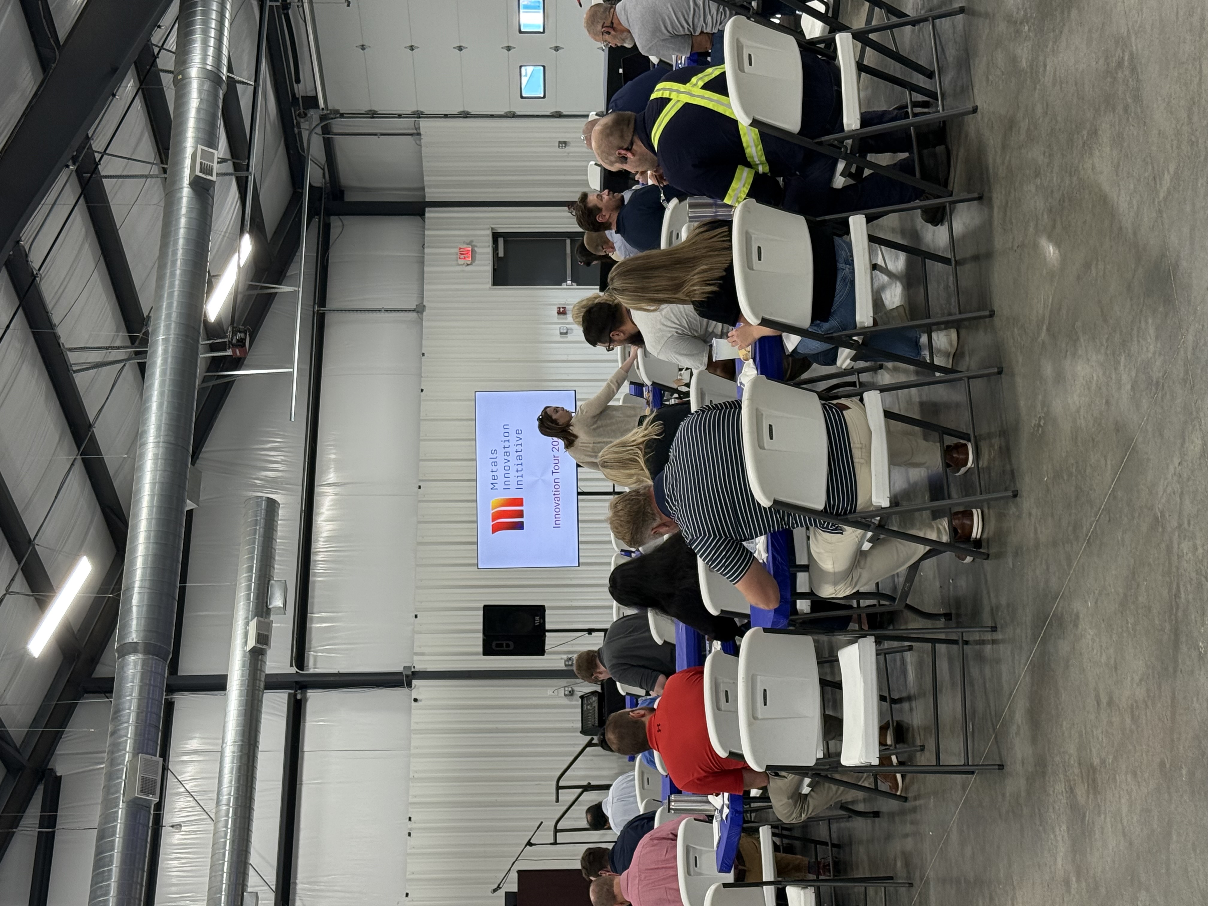 Attendees seated for the Innovation Tour presentation