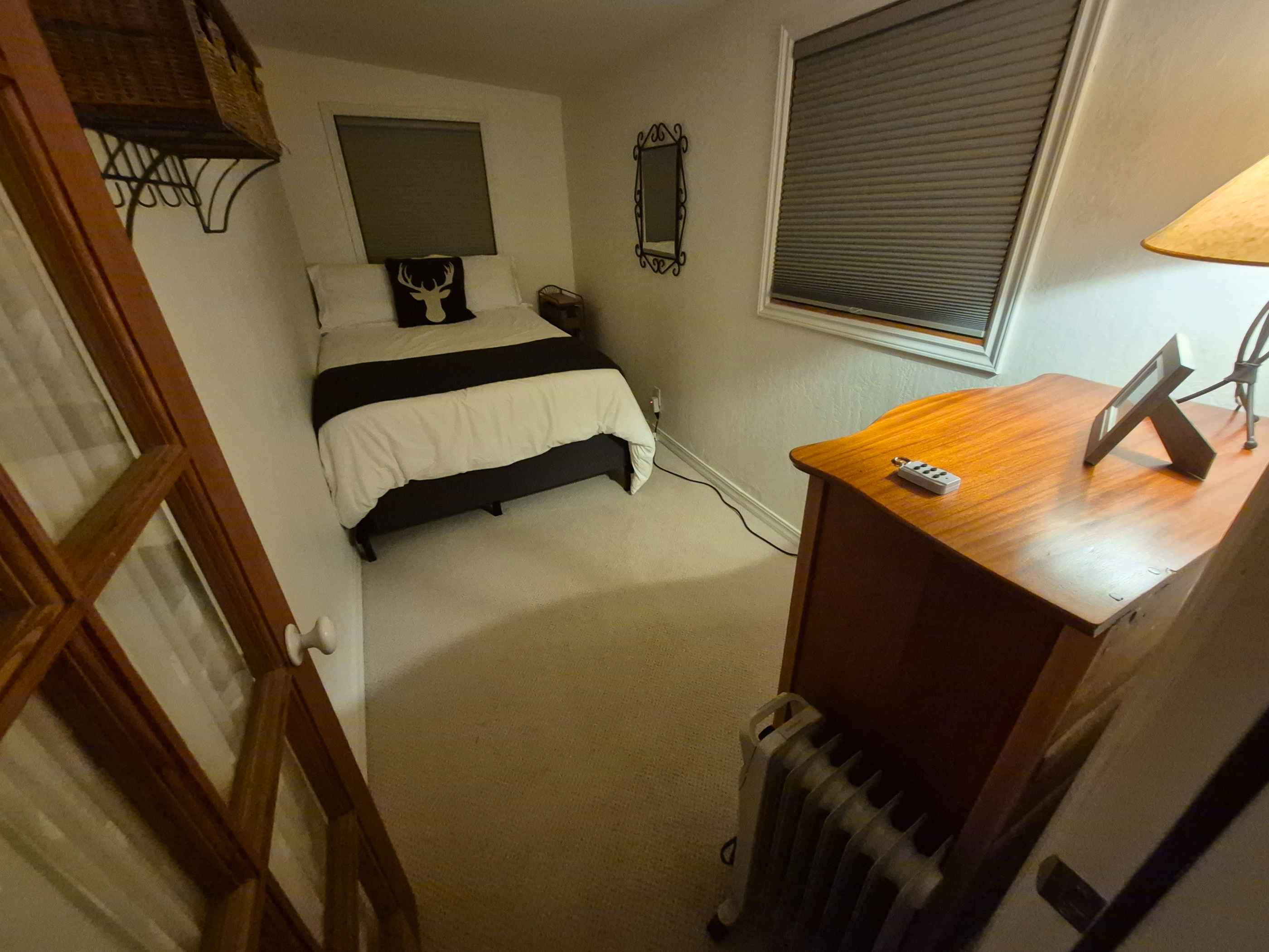 high angle of a bedroom that has just been cleaned 