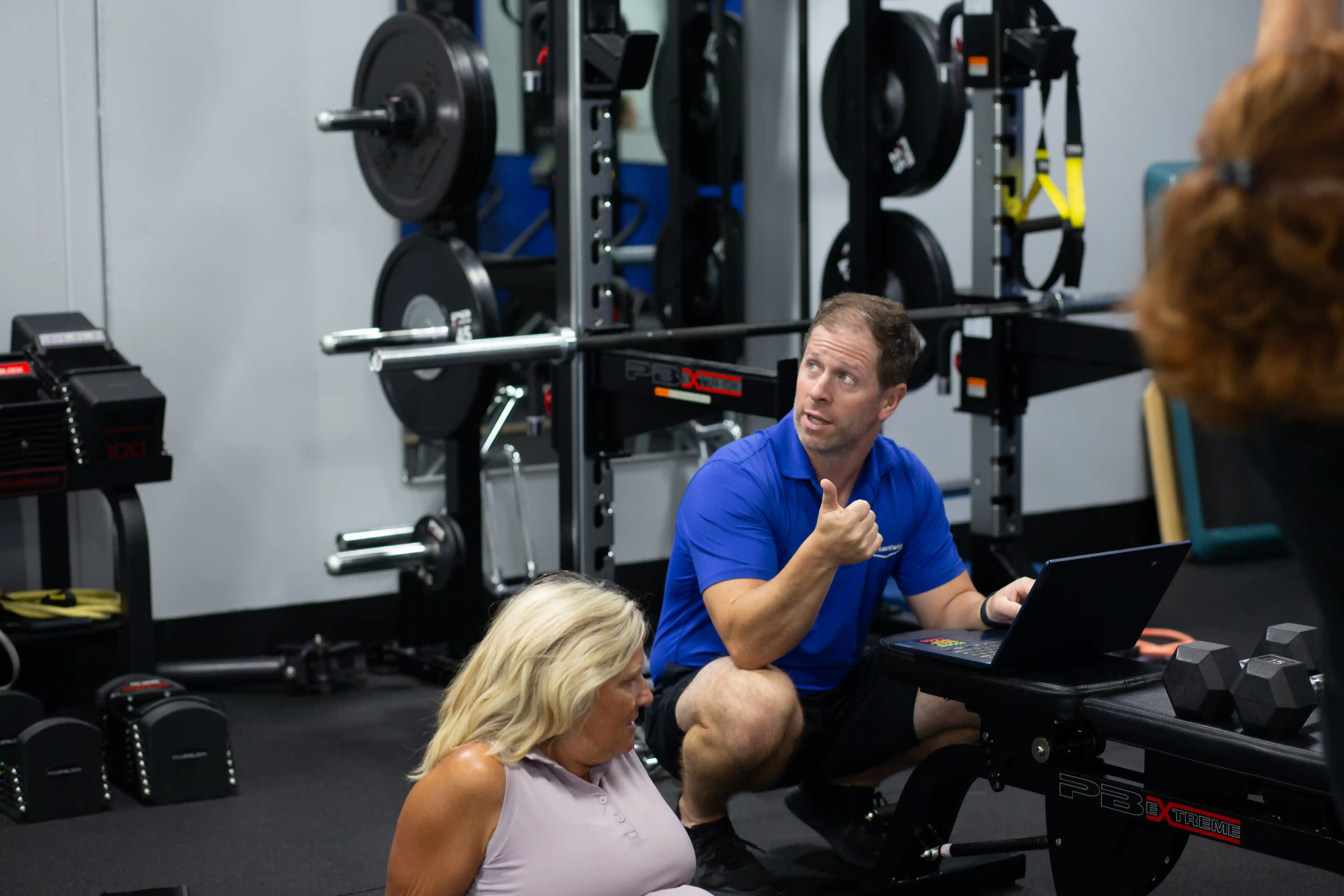 Kevin Dineen training with gym equipment, mid-workout at Structure PF.