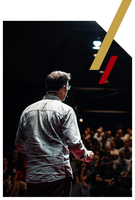 male professional speaker on stage