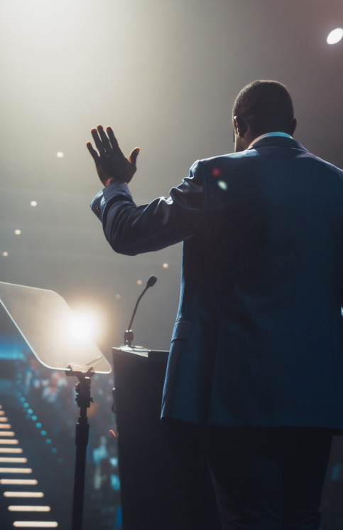 political speaker at podium