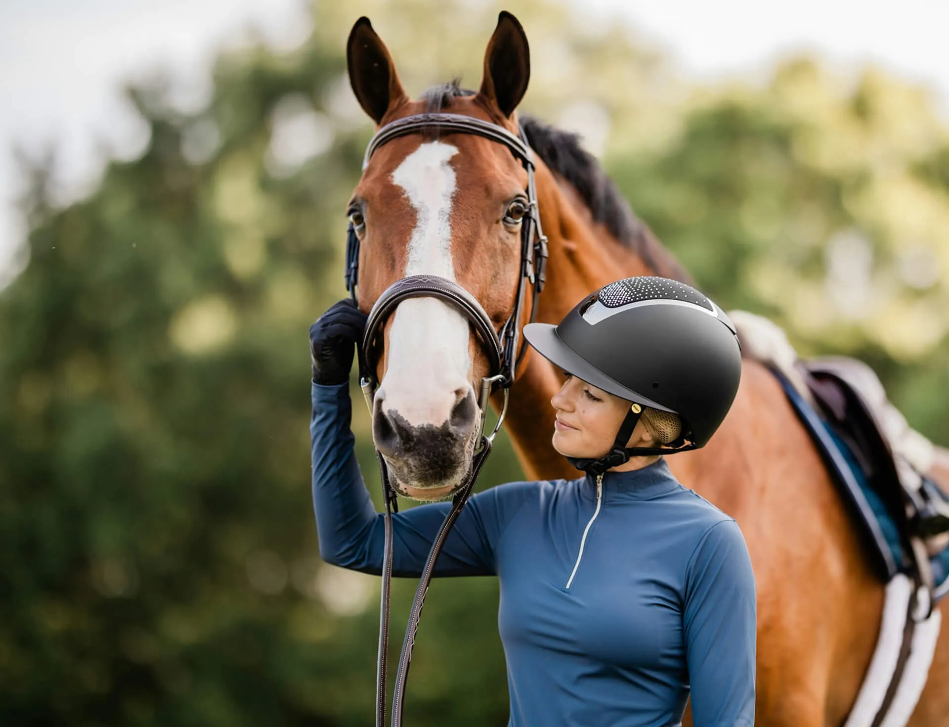 a woman and horse are enjoying each others company