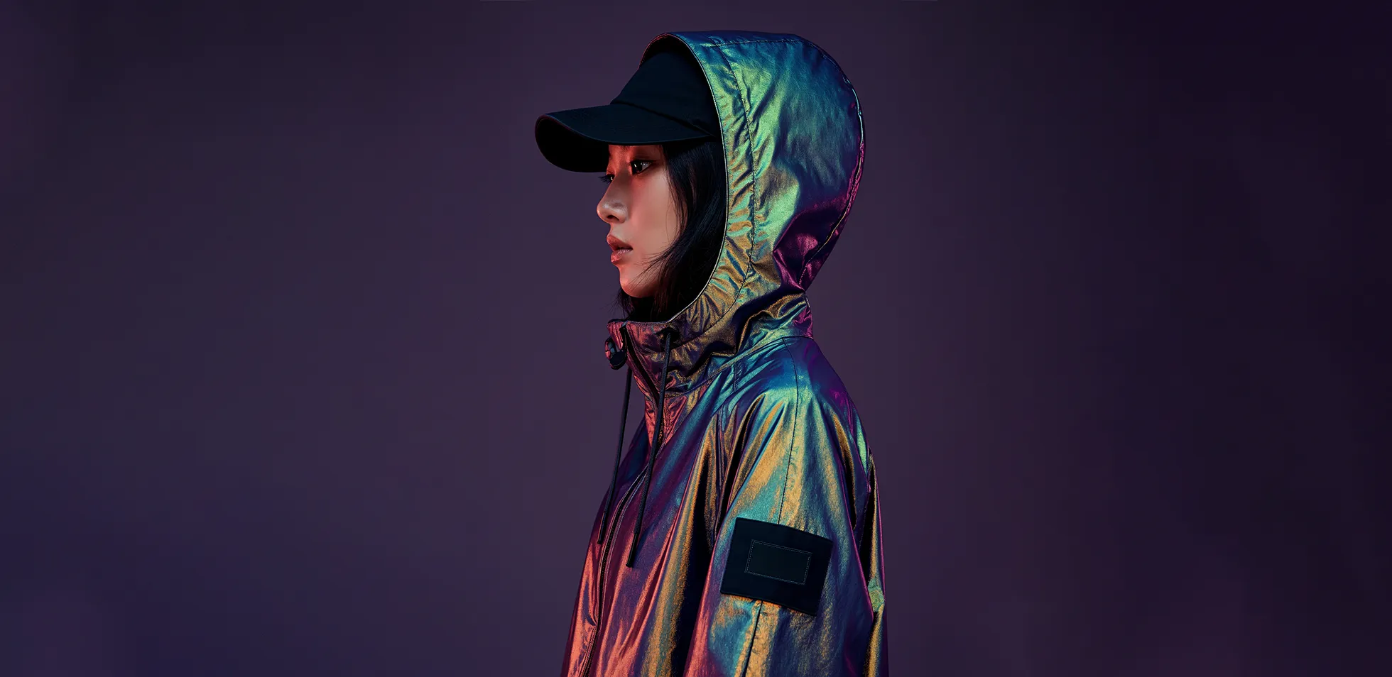 woman wearing jacket with dark background
