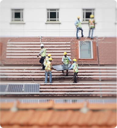 Engineers installing solar panels on a walkway. 