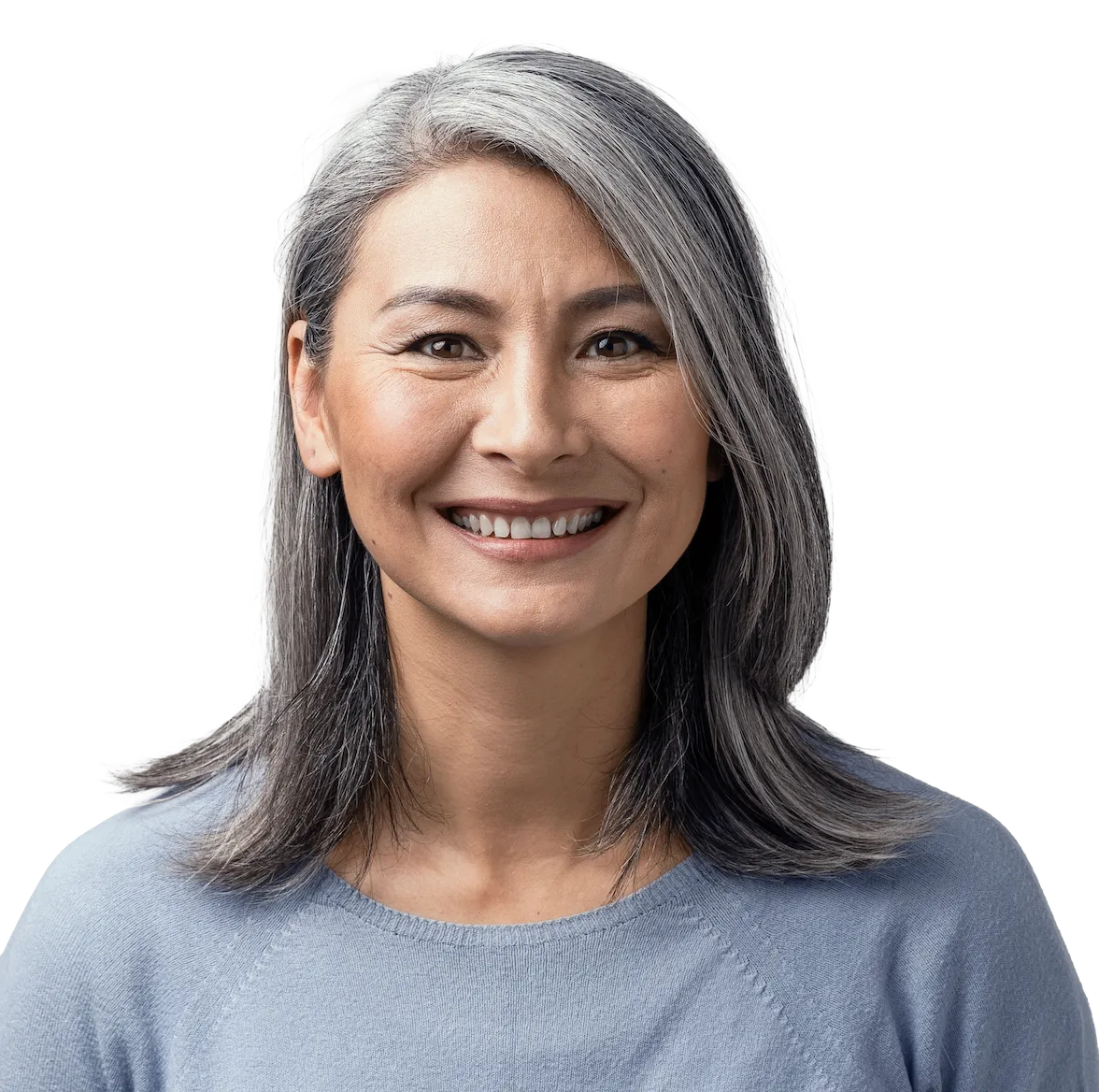 Smiling patient after implant dentistry visit at Omnia Dental Care in Chino Hills CA