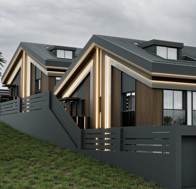 Close-up view of modern villa exterior with concrete and wood paneling, accent wall lights, glass doors, manicured lawn, and neatly trimmed yellow shrubs along the foundation.