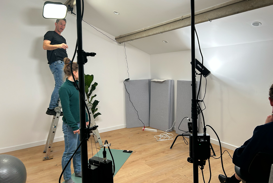 Employees at Flok Health in the film studio