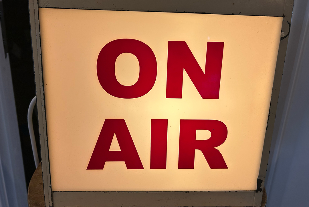 A lightbox displaying the words "ON AIR"