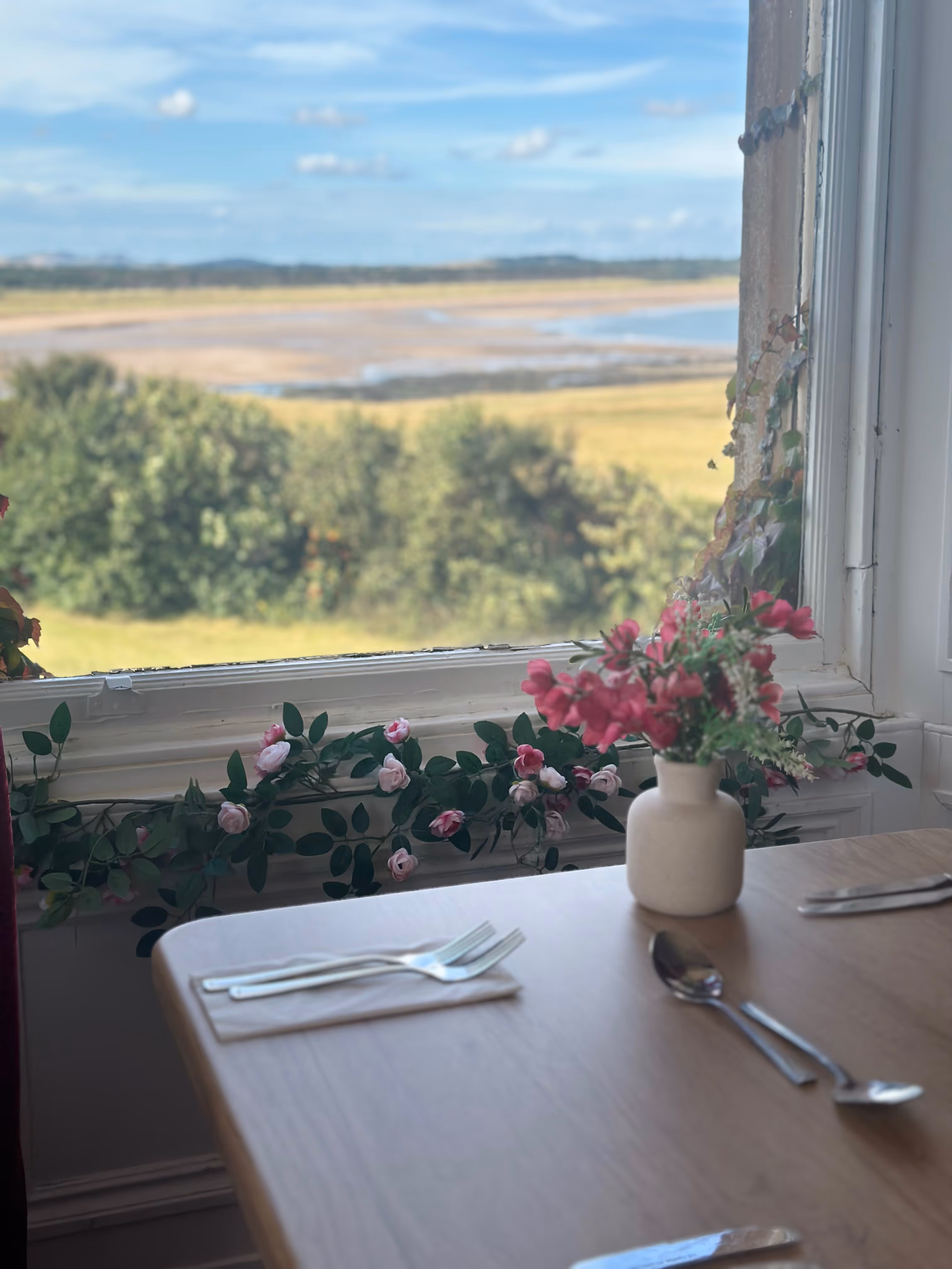 A seaside view over Belhaven Bay from the upstairs restaurant at Aunty D's, Dunbar. 