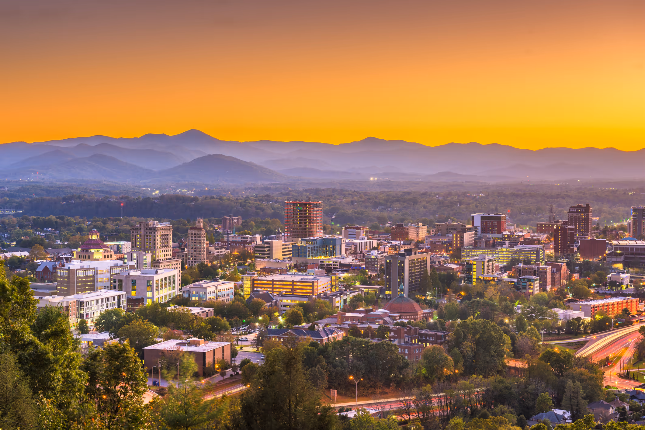 Asheville, NC city skyline at dusk