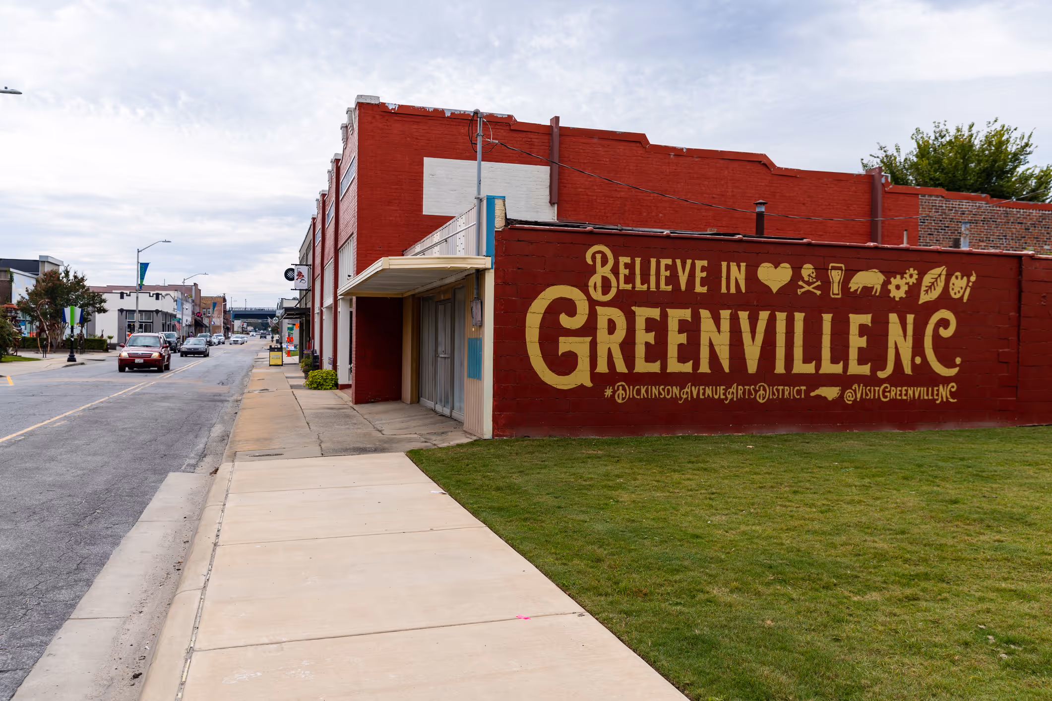 A building with the words "Greenville, NC" on the side of it.