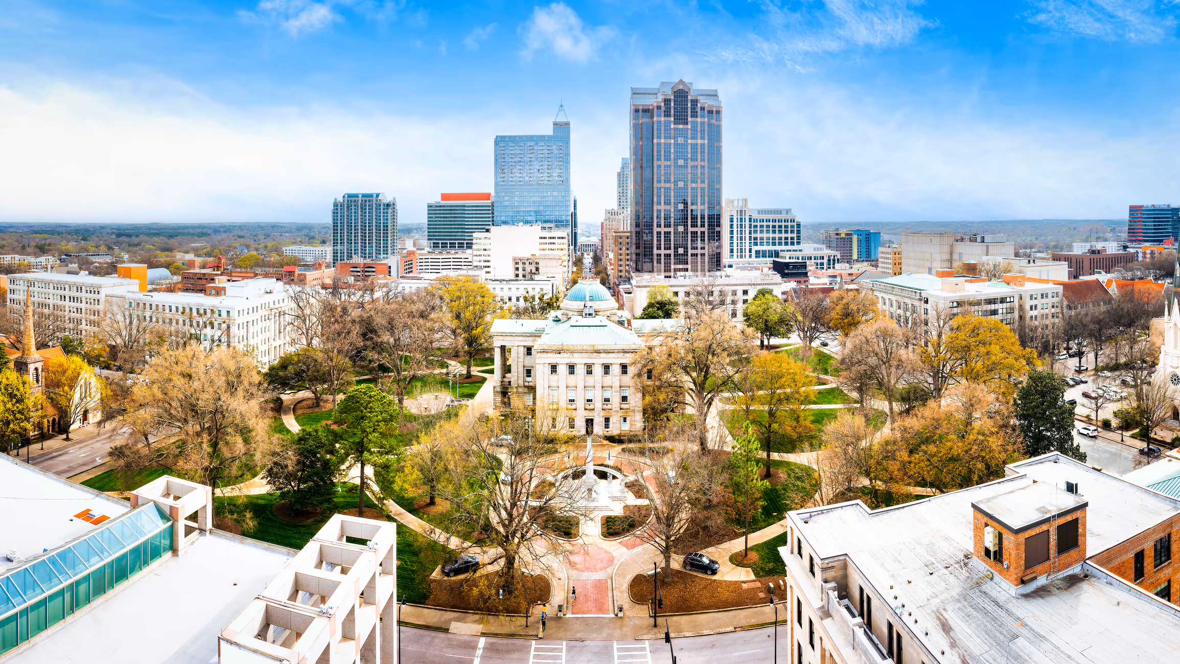 Raleigh, NC city skyline during the day.