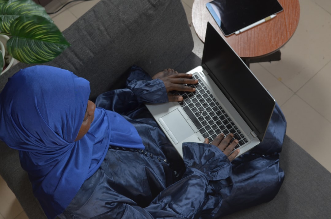 person relaxing at home with laptop - virtual tax preparation