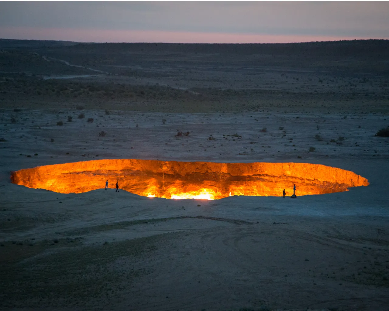 The glowing Darvaza gas crater, "Gates of Hell," burning in the Karakum Desert, Turkmenistan.
