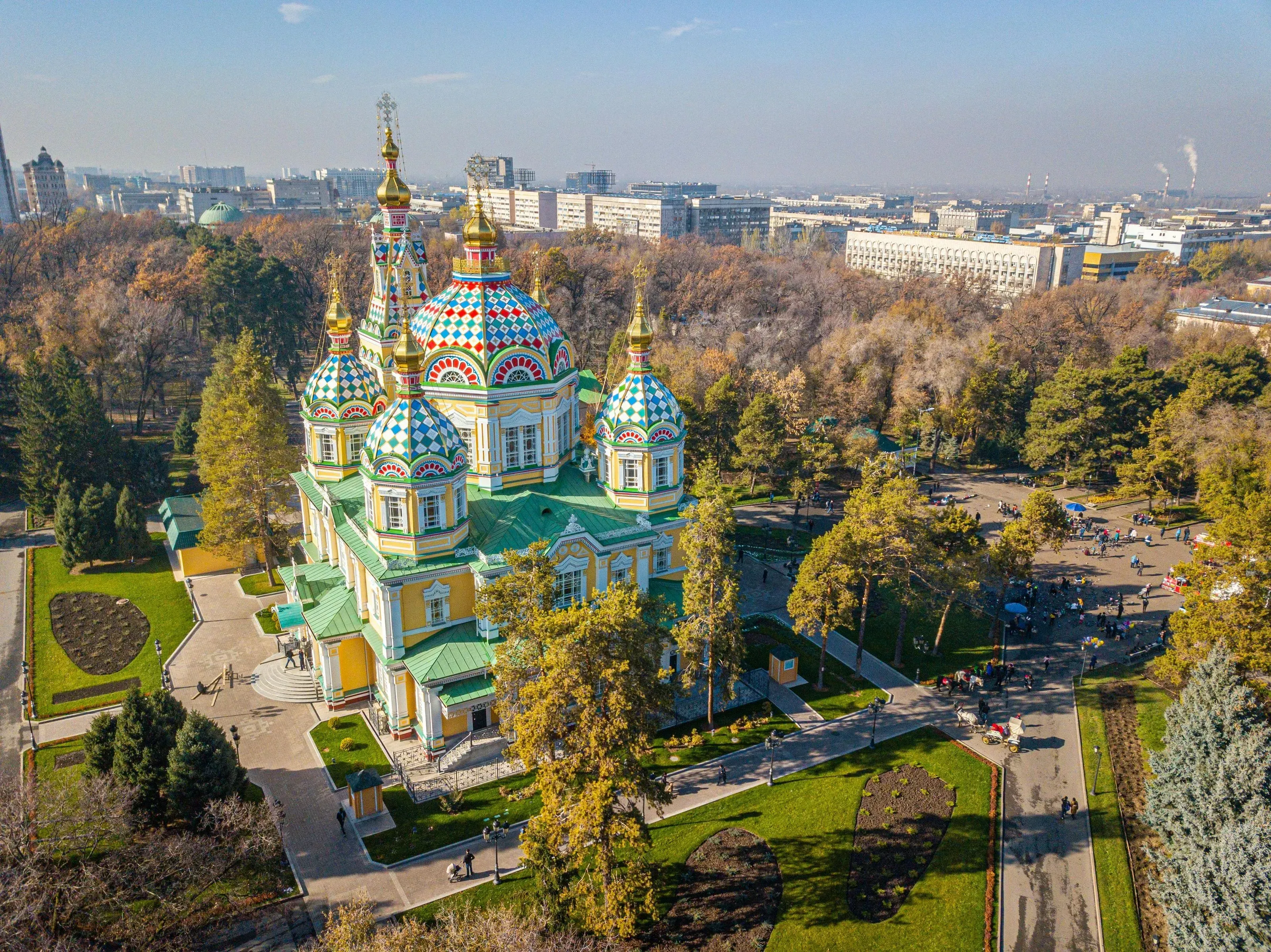 Kazakhstan Almaty Zenkov Cathedral - Colorful Zenkov Cathedral in Almaty, Kazakhstan, surrounded by parkland.
