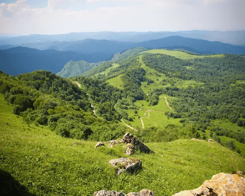 Rolling green mountains of Armenia, perfect for hiking and exploring untouched nature.