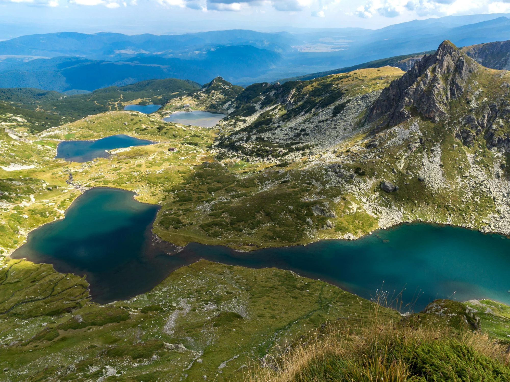Stunning aerial view of Bulgaria’s Seven Rila Lakes, a popular hiking destination with crystal-clear glacial waters.