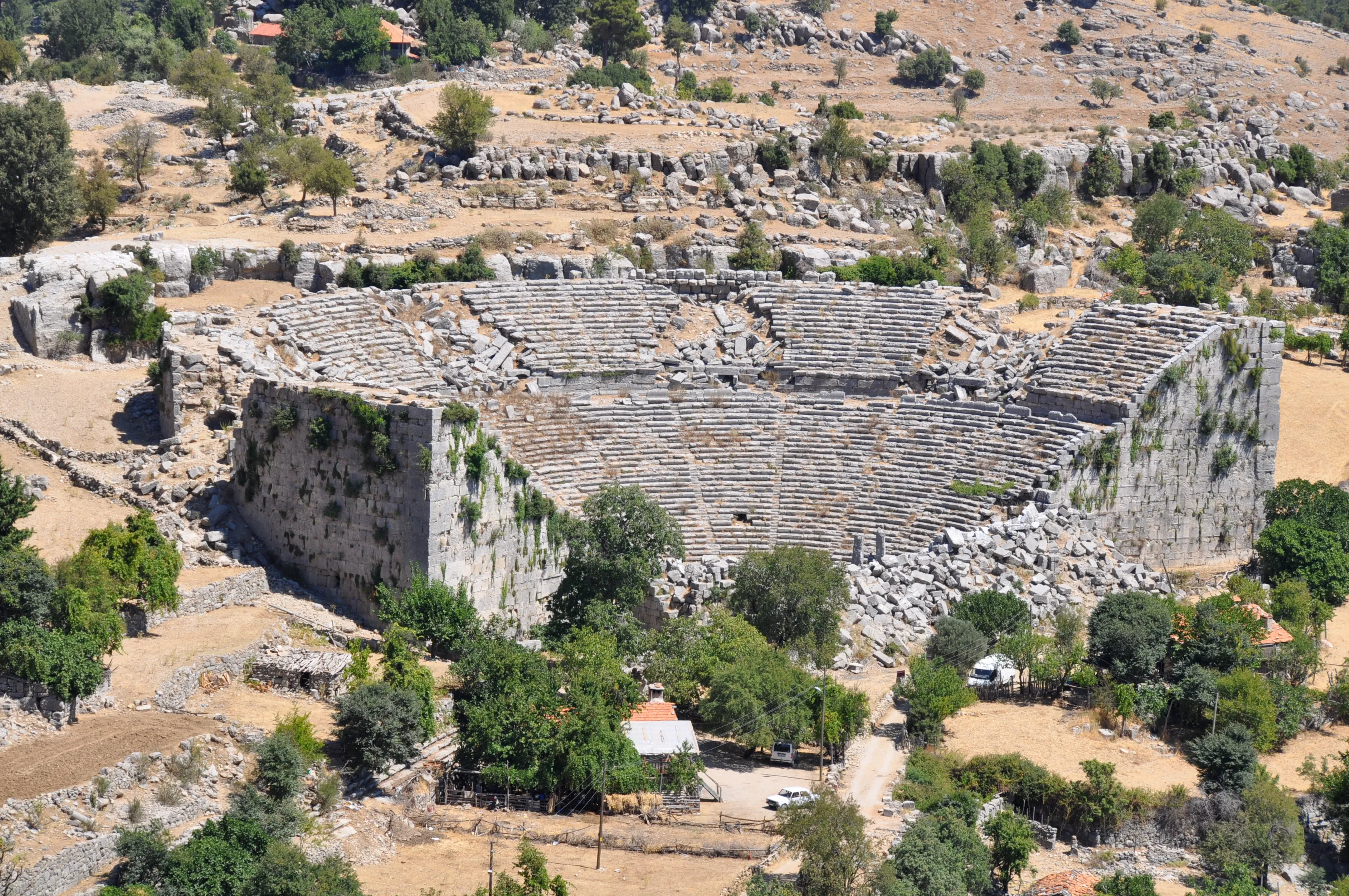 The ancient ruins of the Selge Theatre sit among rugged hills and greenery along the St. Paul Trail.