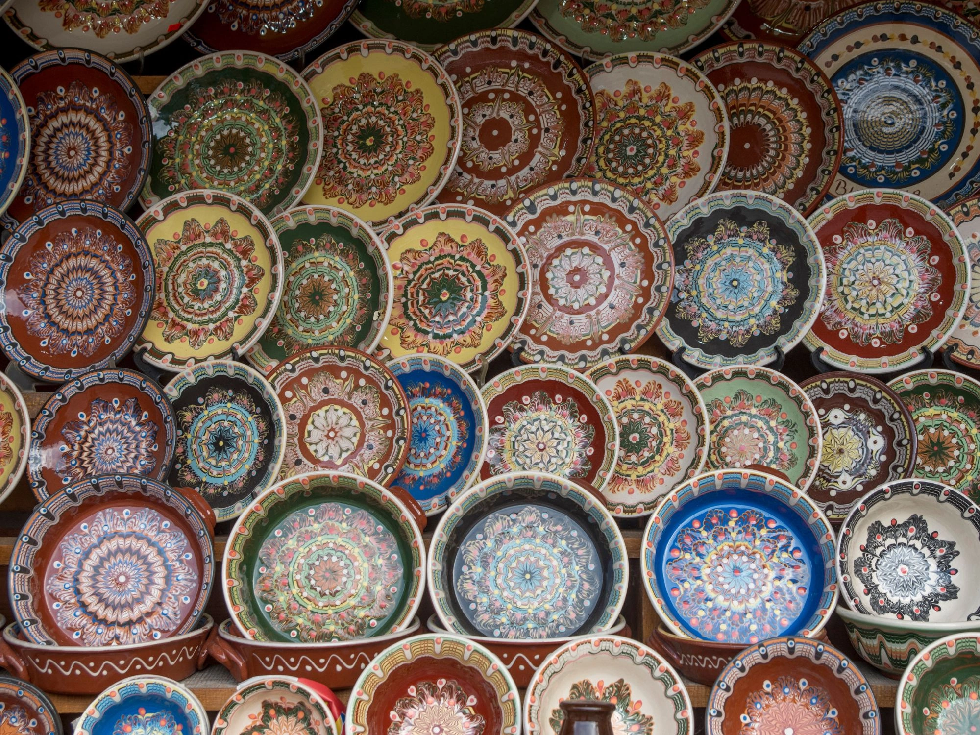 Traditional Troyan Pottery, Bulgaria - Colorful hand-painted ceramic plates from Troyan, Bulgaria.