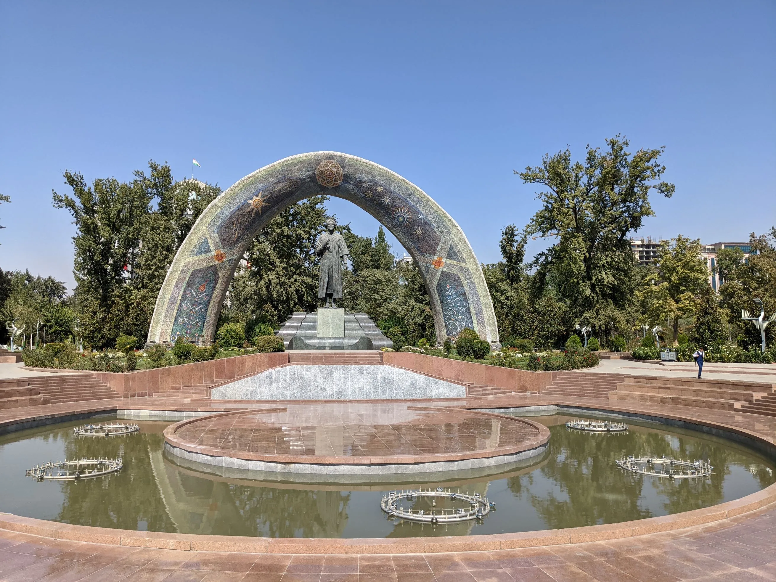 Rudaki Park, Dushanbe: The grand Rumi monument stands under a mosaic arch in the lush heart of Tajikistan’s capital.