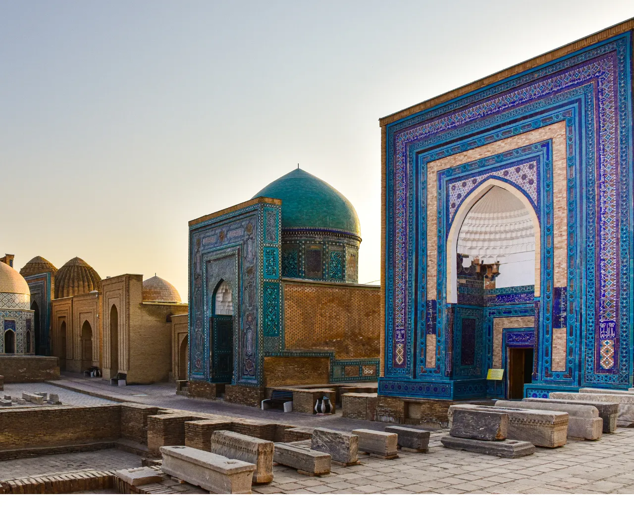 The ancient Shah-i-Zinda necropolis in Samarkand, Uzbekistan, with vibrant blue tilework.