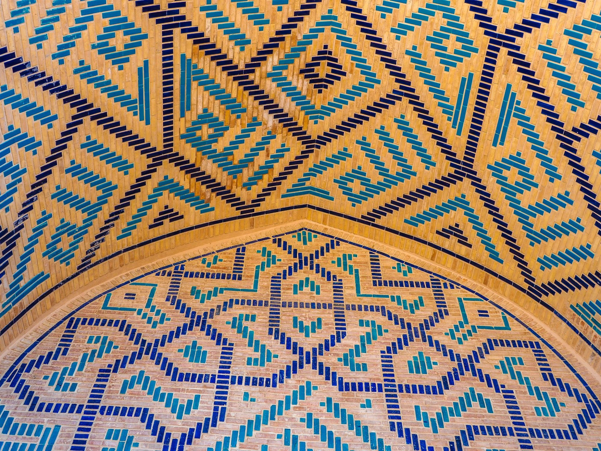 Geometric tilework detail on the ceiling of a historic building in Merv, Turkmenistan.