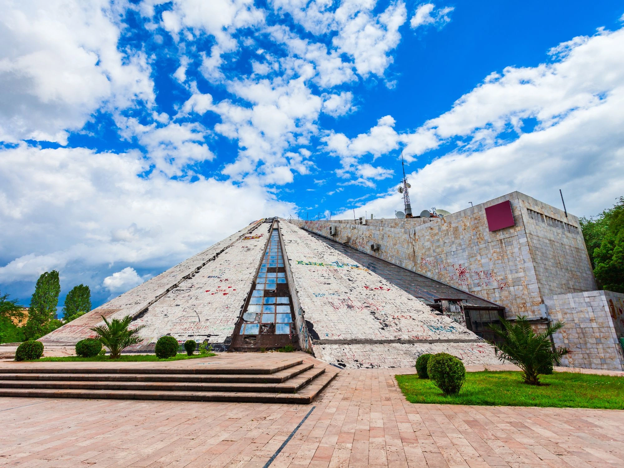 The Pyramid of Tirana, Albania, a relic of communist-era architecture, now a symbol of the city’s evolution.