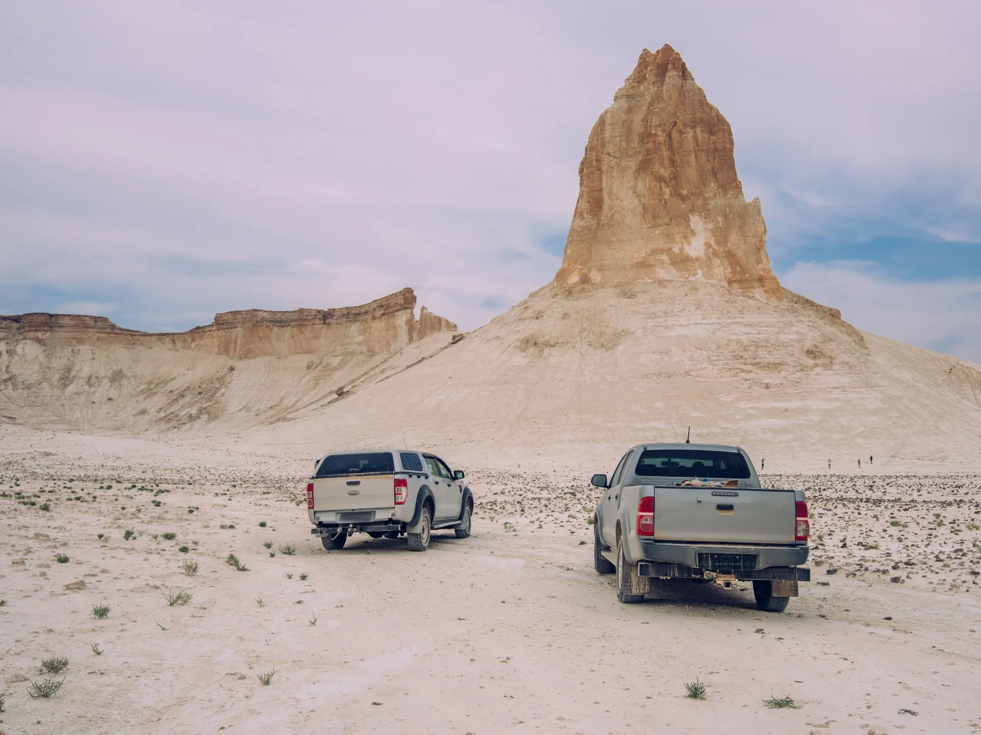 Bozzhyra’s towering spires in Mangystau, Kazakhstan, create a surreal landscape perfect for nature and adventure tours.