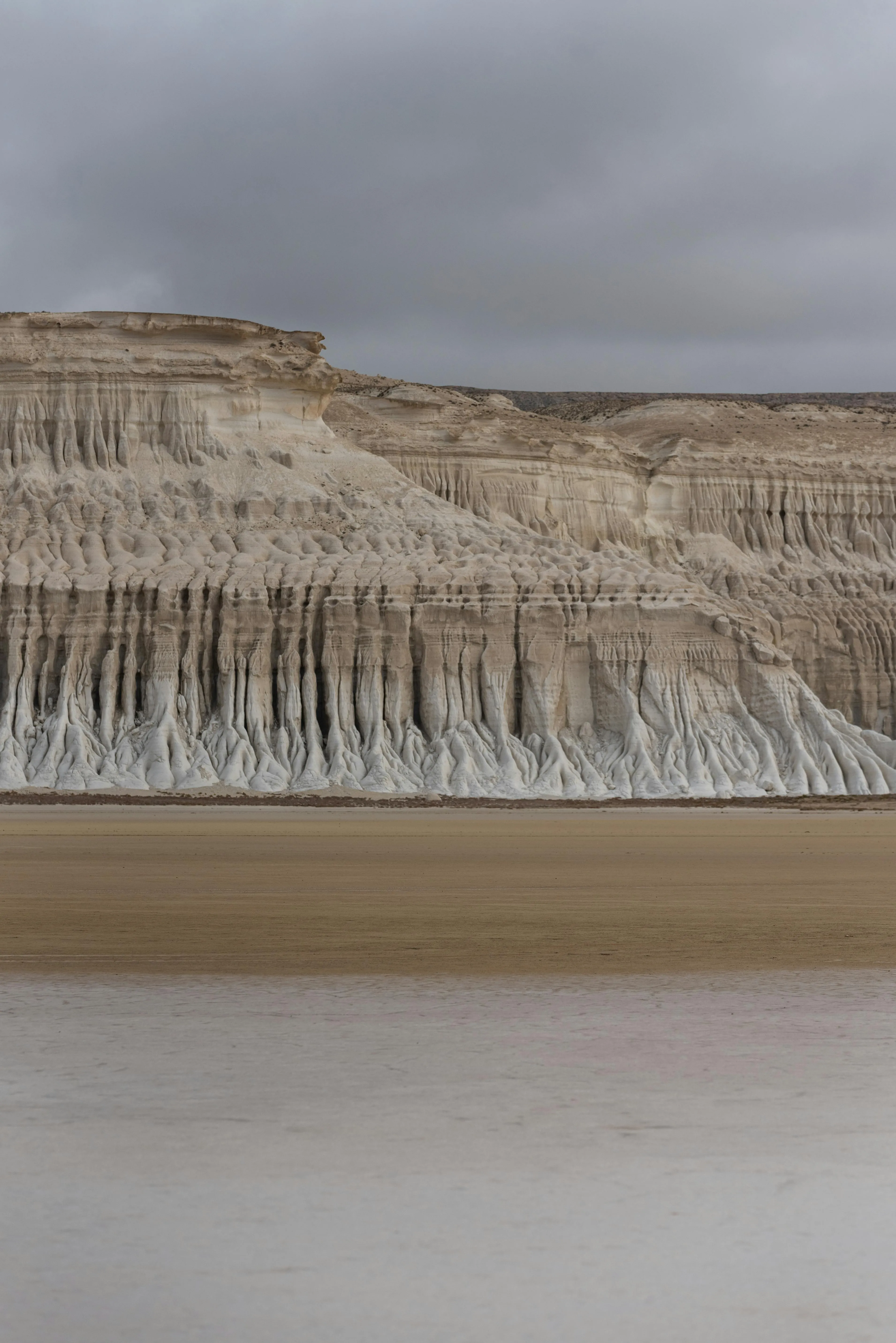 A sweeping view of Mangystau’s rocky plateaus and cliffs, showcasing the region's unique erosion patterns and arid beauty.