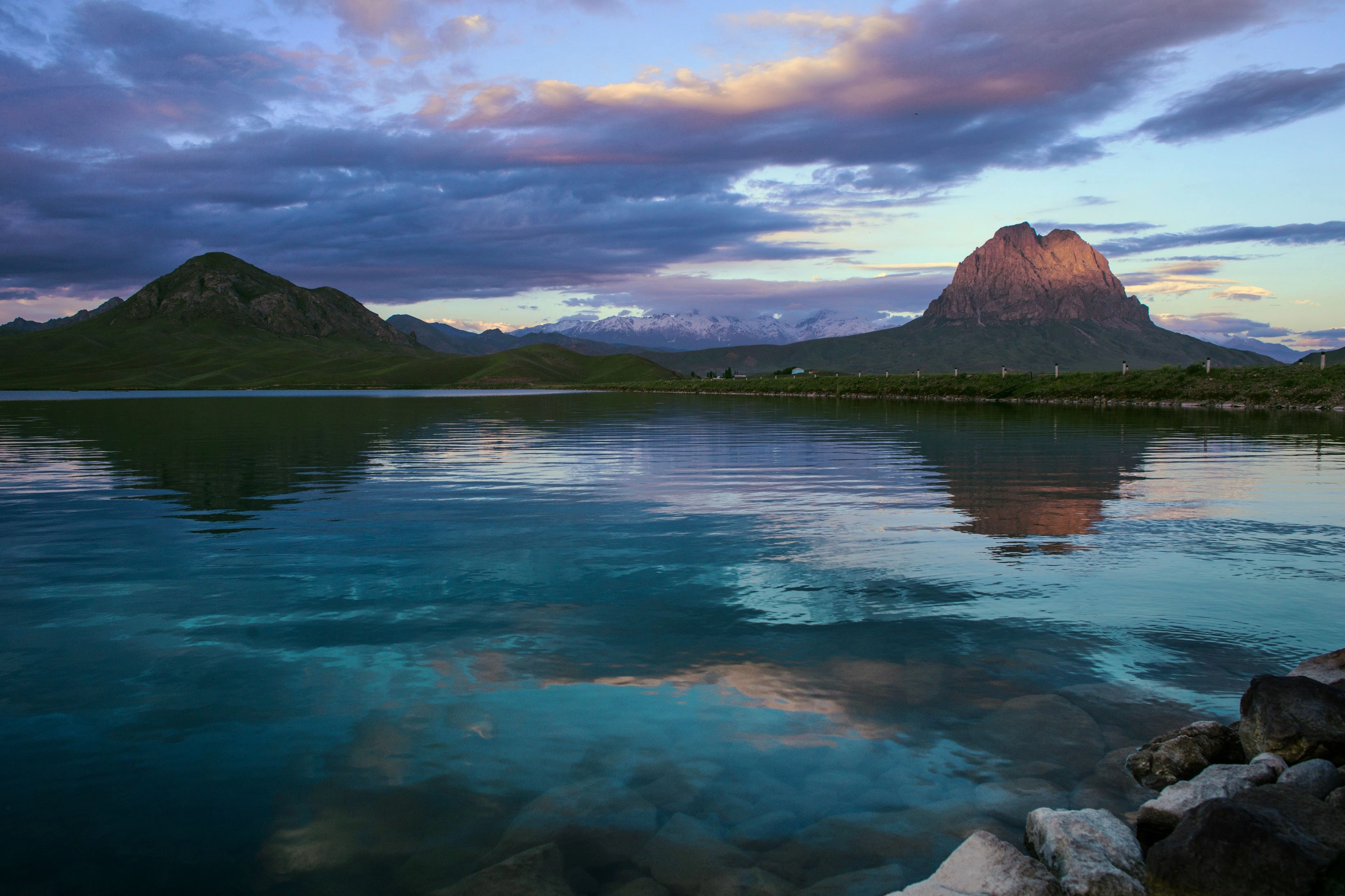 Crystal-clear waters of Beneniyar Reservoir reflect mountains in Nakhchivan.