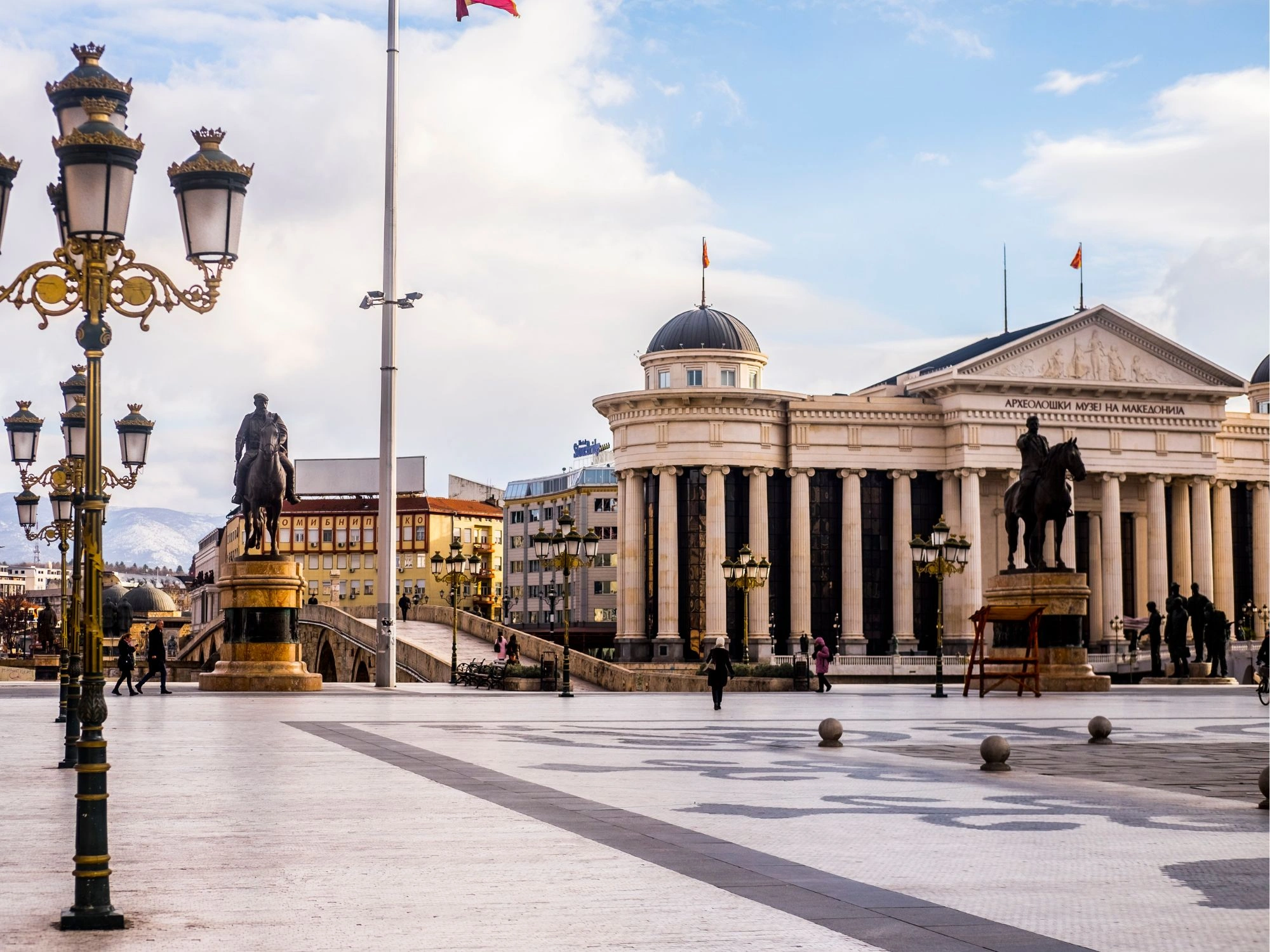 Archaeological Museum of Macedonia and statues in the central square of Skopje, North Macedonia.