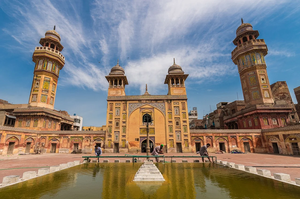 Wazir Khan Mosque Lahore, stunning Mughal architecture and tiled minarets.
