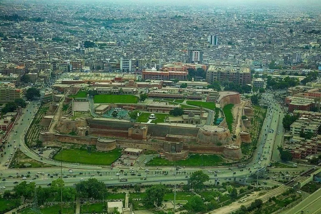 Aerial view of Derawar Fort Bahawalpur, massive desert fort with square bastions and green lawns.