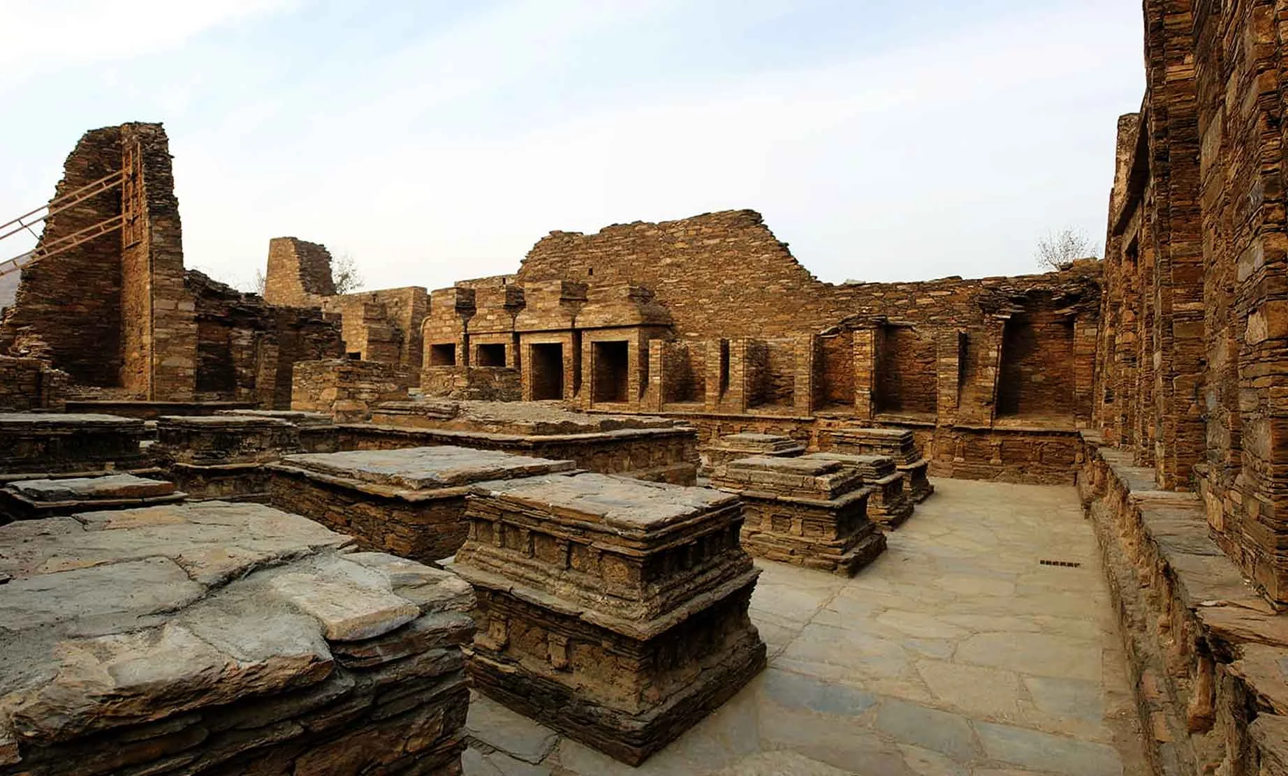 Gandhara Heritage ruins in Pakistan, ancient Buddhist monastery stone structures.
